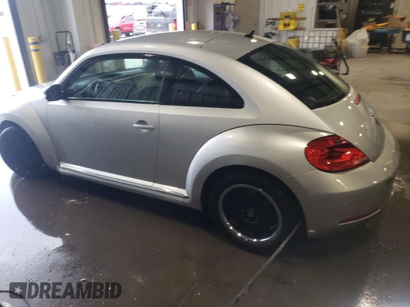 2012 Volkswagen Beetle 2.5L PZEV with VIN 3VWJP7AT8CM603469, listed as a Copart auction lot 56371425 with 97,575 mi miles and Clean title. Bid and sale history available at DreamBid. Image 2.