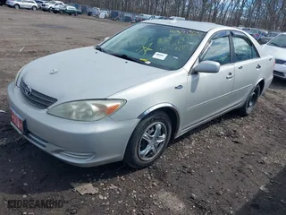 2003 Toyota Camry LE with VIN 4T1BE32K33U726440, listed as a IAAI auction lot 41831850 with 999,999 mi miles. Bid and sale history available at carsss.com. Image 2.