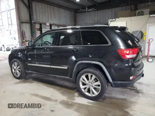 2011 Jeep Grand Cherokee 70th Anniversary with VIN 1J4RR4GG5BC677838, listed as a Copart auction lot 51516665 with 218,120 mi miles and Salvage Title. Bid and sale history available at carsss.com. Image 2.