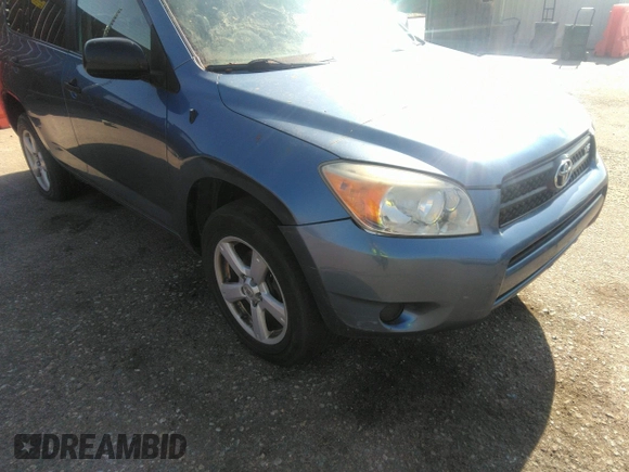 2007 Toyota RAV4 with VIN JTMBK33V676020269, listed as a IAAI auction lot 42121522 with 327,878 mi miles. Bid and sale history available at carsss.com. Image 6.
