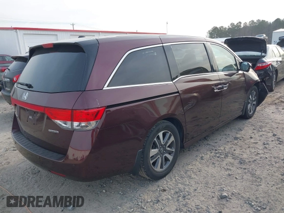 2015 Honda Odyssey Touring Elite with VIN 5FNRL5H9XFB026405, listed as a IAAI auction lot 41780562 with 134,897 mi miles and . Bid and sale history available at DreamBid. Image 4.