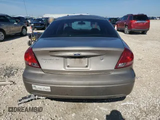 2004 Ford Taurus SE with VIN 1FAFP53U04A141688, listed as a Copart auction lot 55606685 with 134,548 mi miles and Salvage Title. Bid and sale history available at DreamBid. Image 6.