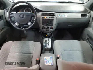 2008 Suzuki Forenza z VIN KL5JD56Z48K957359, wystawiony jako Copart lot #79184084 z przebiegiem 142 632 mil mil oraz Tytuł czysty. Historia ofert i sprzedaży dostępna na DreamBid. Obrazek 8.