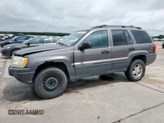 2003 Jeep Grand Cherokee Laredo with VIN 1J4GW48SX3C569087, listed as a Copart auction lot 55941035 with Not provided miles and Salvage title. Bid and sale history available at DreamBid. Image 1.