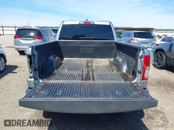 2020 Ram 1500 Big Horn with VIN 1C6RREBT8LN294862, listed as a IAAI auction lot 42174416 with 119,334 mi miles and . Bid and sale history available at DreamBid. Image 18.
