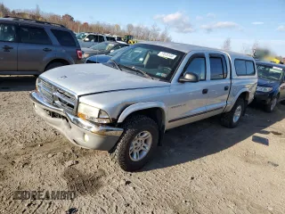2001 Dodge Dakota z VIN 1B7HG2AXX1S251376, wystawiony jako Copart lot #77015144 z przebiegiem 163 751 mil mil oraz Szkoda całkowita • Salvage title. Historia ofert i sprzedaży dostępna na DreamBid. Obrazek 1.