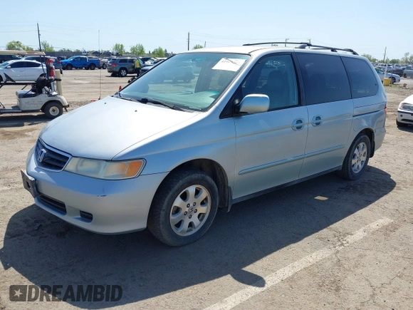 2003 Honda Odyssey EX with VIN 2HKRL18603H502236, listed as a IAAI auction lot 41929501 with 287,538 mi miles and . Bid and sale history available at DreamBid. Image 2.