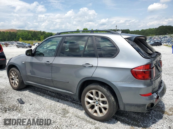 2012 BMW X5 35i with VIN 5UXZV4C50CL991452, listed as a Copart auction lot 56890265 with 147,019 mi miles and Salvage title. Bid and sale history available at DreamBid. Image 2.