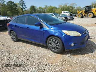 2012 Ford Focus SE with VIN 1FAHP3F20CL215573, listed as a Copart auction lot 51129555 with 112,283 mi miles and Salvage Title. Bid and sale history available at carsss.com. Image 4.