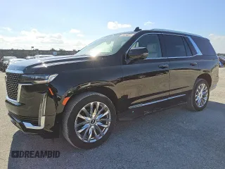 2023 Cadillac Escalade 4WD Premium Luxury z VIN 1GYS4BKL5PR365290, wystawiony jako Copart lot #56997165 z przebiegiem 46 466 mil mil oraz Tytuł czysty. Historia ofert i sprzedaży dostępna na DreamBid. Obrazek 1.