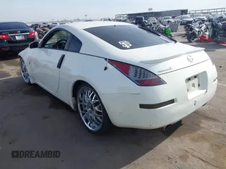 2004 Nissan 350Z Touring with VIN JN1AZ34D14M102966, listed as a IAAI auction lot 41921270 with 182,633 mi miles. Bid and sale history available at carsss.com. Image 3.