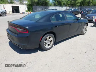 2015 Dodge Charger SE with VIN 2C3CDXBG9FH790573, listed as a IAAI auction lot 42142908 with 195,182 mi miles and . Bid and sale history available at carsss.com. Image 4.