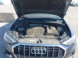 2021 Audi Q3 Premium with VIN WA1AUCF32M1066149, listed as a IAAI auction lot 40695269 with 92,598 mi miles and . Bid and sale history available at DreamBid. Image 10.