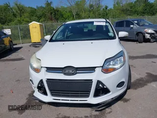 2013 Ford Focus SE with VIN 1FADP3F26DL203377, listed as a IAAI auction lot 41998750 with 70,000 mi miles. Bid and sale history available at carsss.com. Image 12.
