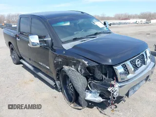 2014 Nissan Titan S with VIN 1N6AA0EC6EN514642, listed as a IAAI auction lot 41833131 with 77,100 mi miles. Bid and sale history available at carsss.com. Image 1.