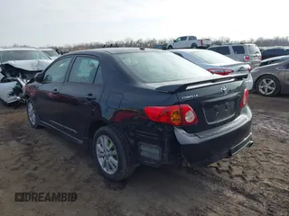 2009 Toyota Corolla with VIN 2T1BU40E29C124161, listed as a IAAI auction lot 41091324 with 128,310 mi miles. Bid and sale history available at carsss.com. Image 3.
