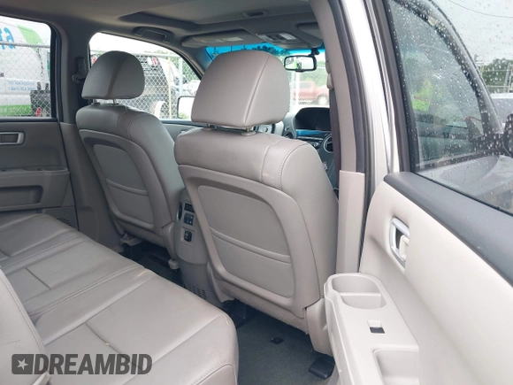2014 Honda Pilot EX-L with VIN 5FNYF3H73EB011880, listed as a IAAI auction lot 42157396 with 73,881 mi miles and . Bid and sale history available at carsss.com. Image 8.