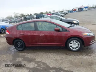 2011 Honda Insight with VIN JHMZE2H37BS011148, listed as a IAAI auction lot 41953167 with 79,143 mi miles and . Bid and sale history available at DreamBid. Image 13.