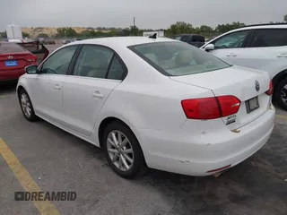 2013 Volkswagen Jetta SE with VIN 3VWDX7AJ1DM374789, listed as a IAAI auction lot 41957918 with 230,052 mi miles and . Bid and sale history available at DreamBid. Image 3.