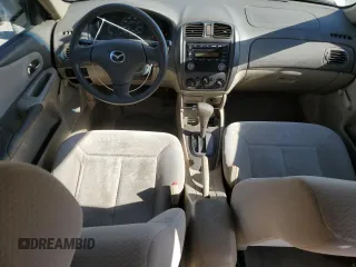 2002 Mazda Protege DX with VIN JM1BJ225520525472, listed as a Copart auction lot 45699915 with 183,457 mi miles and Salvage Title. Bid and sale history available at DreamBid. Image 8.