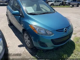 2011 Mazda 2 Sport with VIN JM1DE1HY7B0116561, listed as a IAAI auction lot 42006952 with 139,369 mi miles. Bid and sale history available at carsss.com. Image 1.