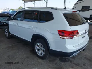 2018 Volkswagen Atlas SE with VIN 1V2CR2CAXJC594811, listed as a IAAI auction lot 42408595 with 65,247 mi miles and . Bid and sale history available at DreamBid. Image 3.