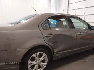 2012 Ford Fusion SE with VIN 3FAHP0HG7CR249339, listed as a IAAI auction lot 41978356 with 122,297 mi miles and . Bid and sale history available at DreamBid. Image 6.