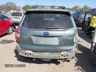 2016 Subaru Forester 2.5i Touring with VIN JF2SJAVC0GH460559, listed as a IAAI auction lot 41829487 with 115,855 mi miles. Bid and sale history available at carsss.com. Image 16.