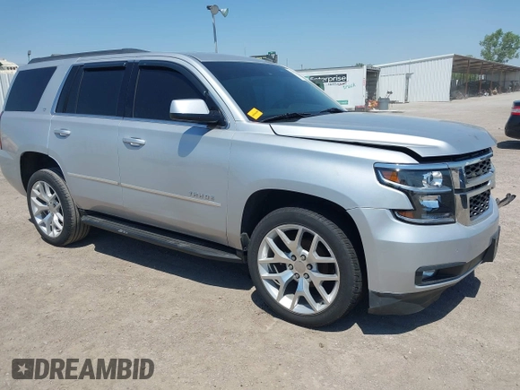 2015 Chevrolet Tahoe LT with VIN 1GNSCBKC6FR303850, listed as a IAAI auction lot 42254115 with 147,856 mi miles and . Bid and sale history available at DreamBid. Image 1.