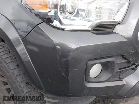 2022 Toyota Tacoma SR5 with VIN 3TMBZ5DN2NM034561, listed as a IAAI auction lot 40867443 with 51,728 mi miles and . Bid and sale history available at DreamBid. Image 6.
