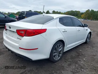 2014 Kia Optima SXL Turbo with VIN 5XXGR4A65EG263055, listed as a IAAI auction lot 40468453 with 93,494 mi miles and . Bid and sale history available at DreamBid. Image 4.