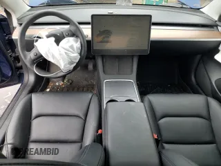 2023 Tesla Model 3 z VIN 5YJ3E1EA3PF627177, wystawiony jako Copart lot #61555235 z przebiegiem 22 340 mil mil oraz Czysty tytuł • Clean title. Historia ofert i sprzedaży dostępna na DreamBid. Obrazek 8.