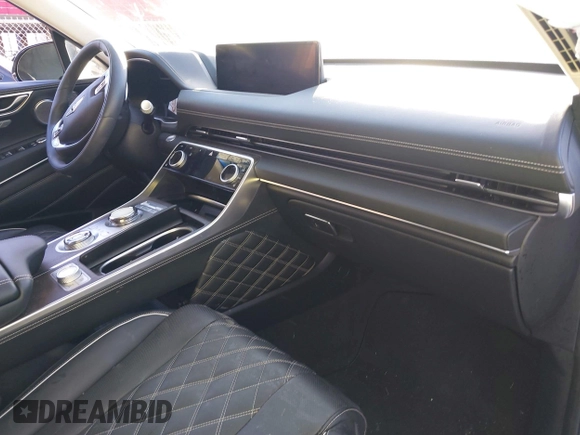 2023 Genesis GV80 with VIN KMUHCESC2PU144051, listed as a IAAI auction lot 41459754 with 14,978 mi miles and . Bid and sale history available at DreamBid. Image 5.