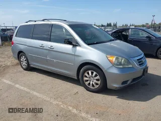 2009 Honda Odyssey EX-L with VIN 5FNRL387X9B055362, listed as a IAAI auction lot 42051881 with 139,172 mi miles. Bid and sale history available at carsss.com. Image 1.