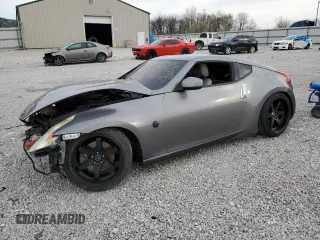 2014 Nissan 370Z Touring with VIN JN1AZ4EH8EM633901, listed as a Copart auction lot 49668815 with 0 mi miles and Salvage Title. Bid and sale history available at carsss.com. Image 1.