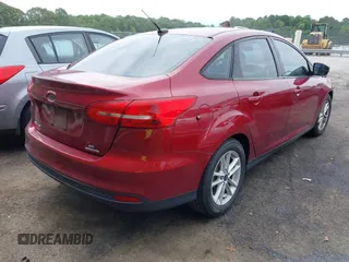 2015 Ford Focus SE with VIN 1FADP3F22FL259223, listed as a IAAI auction lot 42333439 with 77,111 mi miles and . Bid and sale history available at DreamBid. Image 4.