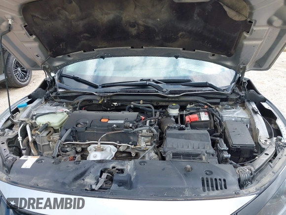 2019 Honda Civic LX with VIN 19XFC2F60KE043806, listed as a IAAI auction lot 41915894 with 123,141 mi miles and . Bid and sale history available at DreamBid. Image 10.