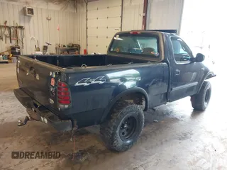 2001 Ford F-150 with VIN 1FTZF182X1KA13166, listed as a IAAI auction lot 42513979 with 197,994 mi miles and . Bid and sale history available at DreamBid. Image 4.