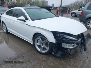 2022 Audi A5 Sportback S line Premium Plus z VIN WAUFACF57NA033636, wystawiony jako IAAI lot #41947545 z przebiegiem 75 797 mil mil oraz . Historia ofert i sprzedaży dostępna na DreamBid. Obrazek 1.