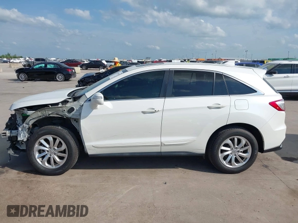 2018 Acura RDX with VIN 5J8TB3H39JL010714, listed as a IAAI auction lot 42128591 with 113,499 mi miles and . Bid and sale history available at DreamBid. Image 15.