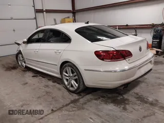 2014 Volkswagen CC Lux with VIN WVWRP7AN9EE519502, listed as a IAAI auction lot 41458158 with 85,988 mi miles. Bid and sale history available at carsss.com. Image 3.