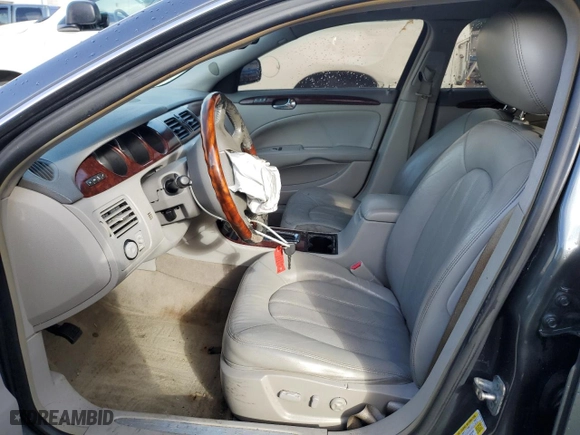 2009 Buick Lucerne CXL with VIN 1G4HD57MX9U115526, listed as a Copart auction lot 58079694 with 128,028 mi miles and Salvage Title. Bid and sale history available at carsss.com. Image 7.