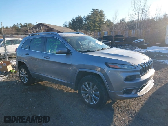 2017 Jeep Cherokee Overland z VIN 1C4PJMJS2HW599477, wystawiony jako IAAI lot #41335748 z przebiegiem 165 330 mil mil oraz . Historia ofert i sprzedaży dostępna na DreamBid. Obrazek 14.