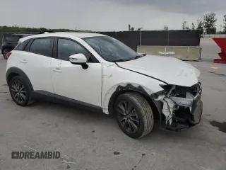 2018 Mazda CX-3 Touring with VIN JM1DKFC78J0331319, listed as a Copart auction lot 51911705 with 44,967 mi miles and Salvage Title. Bid and sale history available at carsss.com. Image 4.