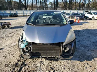 2009 Honda Fit with VIN JHMGE88219S050197, listed as a Copart auction lot 45876345 with 208,046 mi miles and Salvage Title. Bid and sale history available at DreamBid. Image 5.