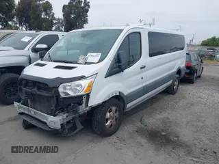 2017 Ford Transit XL z VIN 1FBZX2YM1HKA98823, wystawiony jako IAAI lot #42066291 z przebiegiem 100 011 mil mil oraz . Historia ofert i sprzedaży dostępna na DreamBid. Obrazek 2.