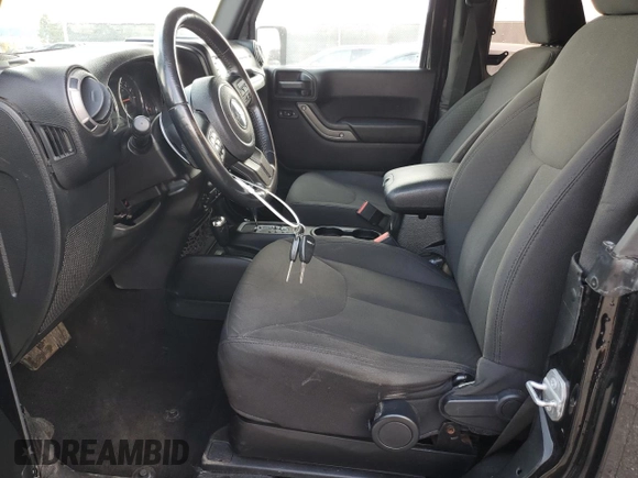 2016 Jeep Wrangler Sport with VIN 1C4AJWAG8GL134327, listed as a Copart auction lot 55039655 with 110,878 mi miles and Clean Title. Bid and sale history available at carsss.com. Image 7.