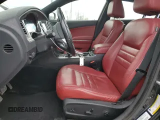 2013 Dodge Charger SXT z VIN 2C3CDXJG2DH615726, wystawiony jako Copart lot #53116535 z przebiegiem 304 919 mil mil oraz Szkoda całkowita • Salvage title. Historia ofert i sprzedaży dostępna na DreamBid. Obrazek 7.