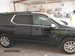 2019 Chevrolet Traverse LT Cloth z VIN 1GNEVGKW6KJ313527, wystawiony jako IAAI lot #42428710 z przebiegiem 117 306 mil mil oraz . Historia ofert i sprzedaży dostępna na DreamBid. Obrazek 13.