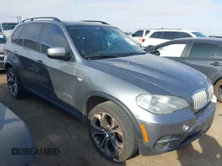 2012 BMW X5 35d with VIN 5UXZW0C53CL671998, listed as a IAAI auction lot 42353227 with 166,031 mi miles and . Bid and sale history available at DreamBid. Image 1.